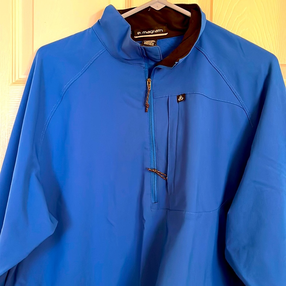 E Magrath men’s golf jacket